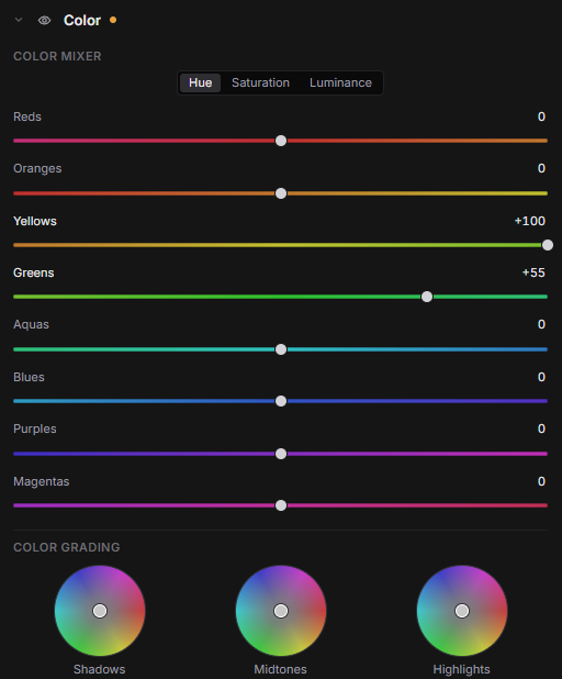 Raelux’s Color panel for the peafowl: the Color Mixer on its Hue tab with Yellows at +100 and Greens at +55, above the three Color Grading wheels